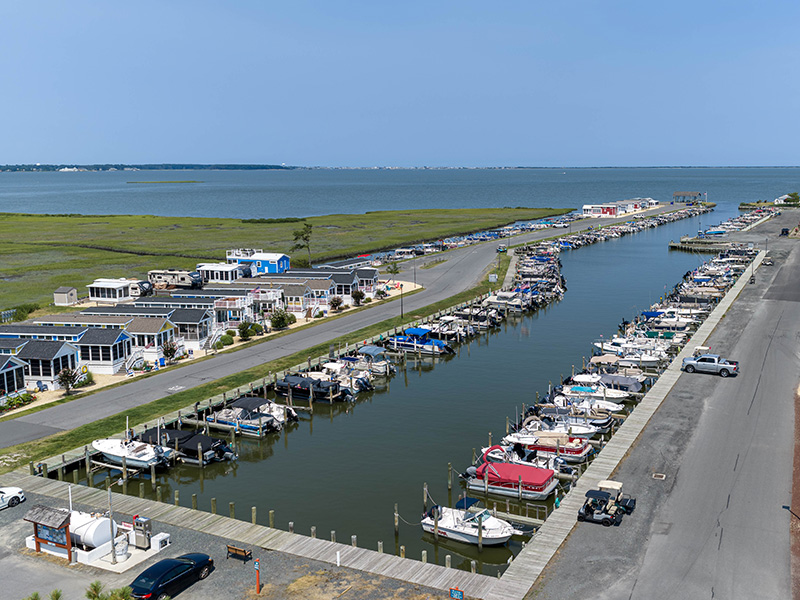 private-community-marina Boats docked at the West Bay private marina with open bay water beyond